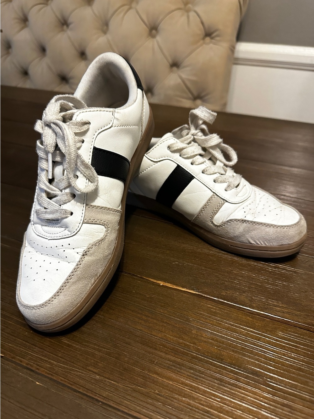 Cute white with brown and black accents sneakers. Size 6-1/2.